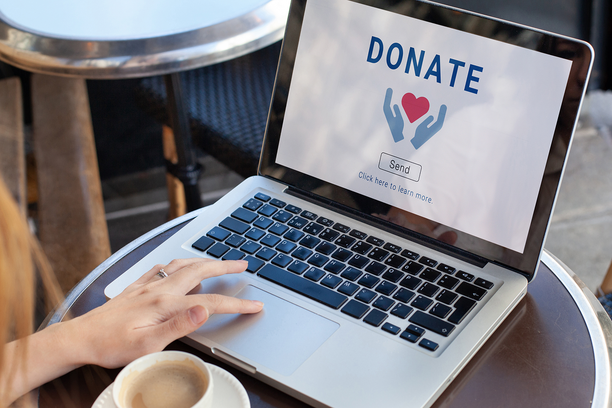 Laptop screen displaying a donation page.