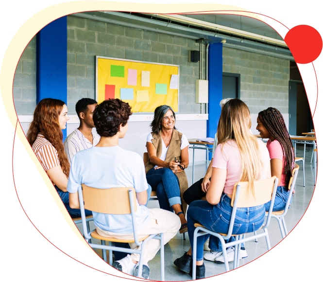 A diverse group engaged in a collaborative discussion in a casual workspace.